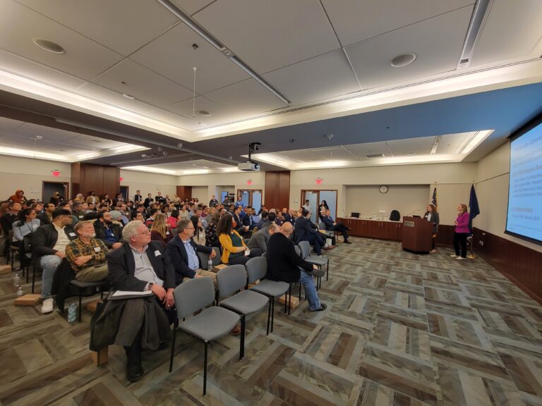 Photo from the front of the room showing the audience during Heidi Mitter and Halie Mitchell's presentation